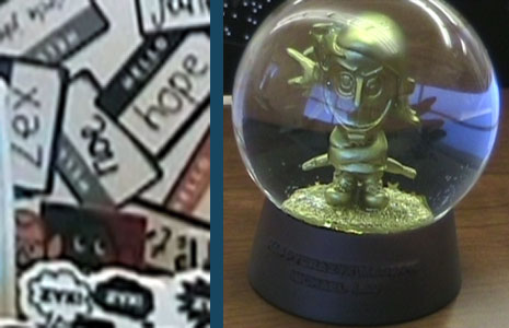 a picture of a michael lau snowglobe and a name on an invitation